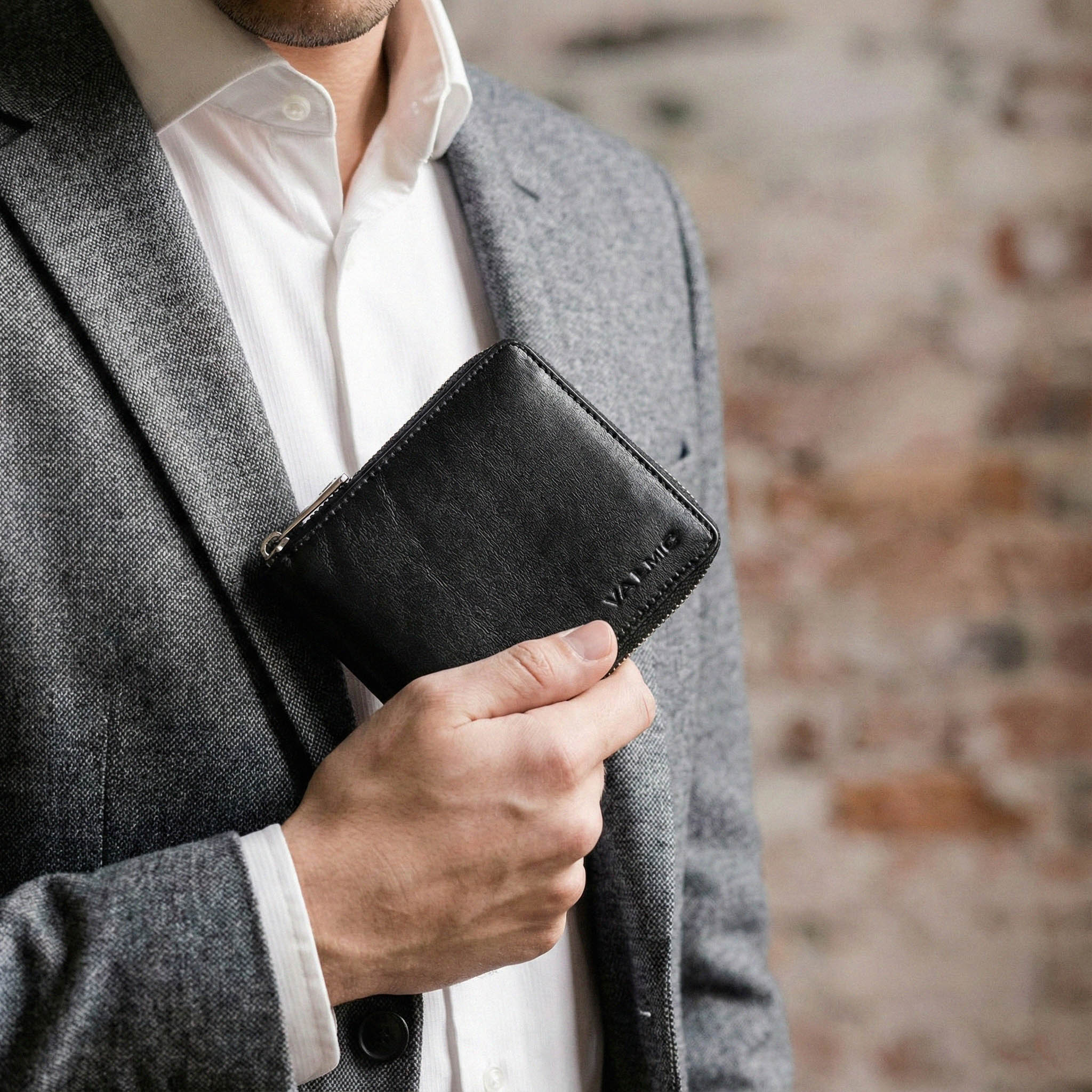 Valmio schwarze Lederbrieftasche mit Reißverschluss