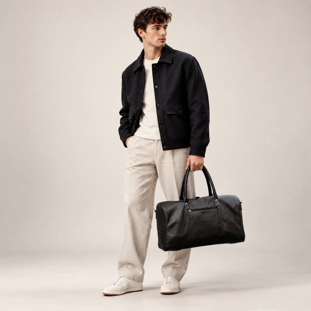 Black full-grain leather travel bag, model Valmio Asfo, for men